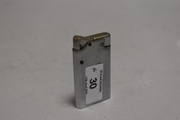 A vintage Benlow master lighter.