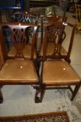 A set of four Chippendale style dining chairs having drop in dralon seats