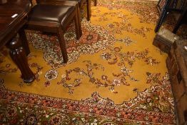 A room sized carpet square, oranges and reds, approx. 360 x 270