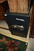 A Master lock combination safe ( we have combination!), approx. Width 39cm, height 61cm, depth 37cm
