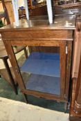 A late 19th Century oak display cabinet, on square tapered legs, approx width 61cm