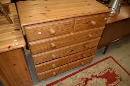 A natural pine chest of two over four drawers, having ply bases, width approx. 88cm