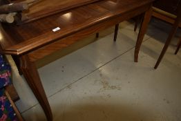 A vintage sapele extending dining table