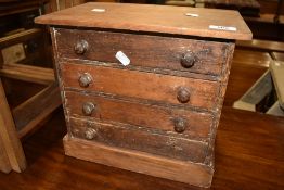 A stripped specimen chest of four drawers, note dimensions approx. W32cm H30cm D20cm