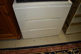 A vintage ply low chest of three drawers