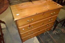 A vintage pine chest of four long drawers, having ply bases, width approx. 82cm