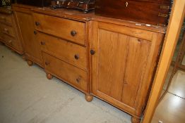A rustic pine dresser base/sideboard, having breakfront, width approx. 186cm