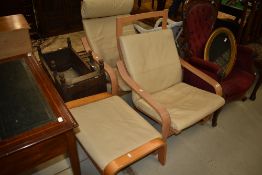 Two modern easy chairs and footstool