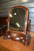 A Victorian mahogany toilet mirror on shaped base, width approx. 50cm