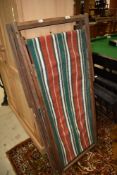 Two vintage deckchairs and a folding directors style chair (the latter having no canvas)