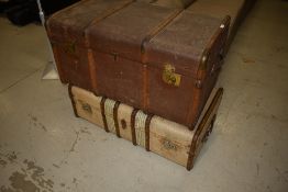 Two vintage luggage trunks