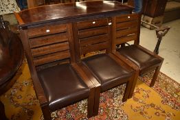 Three modern hardwood and leatherette chairs