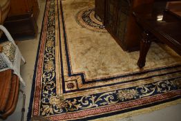 A room sized carpet sqaure, cream red and blue, approx 478 x 273cm