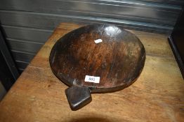 An Antique treen crock lid , repurposed as a chopping board or decorative item, very tactile