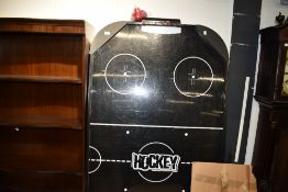 An air hockey table and accesories