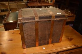A small ply and copper bound trunk/casket having iron handles