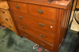 A late Victorian mahogany chest of two over three drawers