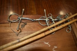Two vintage polo mallets , horse bits etc
