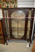An early 20th Century mahogany and glass display cabinet, please note end pane loose