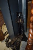 A pair of heavy cast iron bench ends, possibly railway or similar