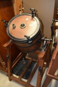 A traditional butter churn on stand