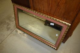 A vintage gilt frame mirror with pink mount detail, approx. 71 x 41cm
