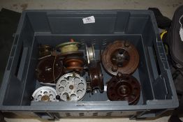A selection of 10 vintage bakolite wood and metal fly reels
