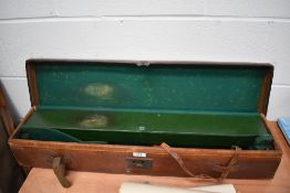 Fitted leather gun case with internal metal fitted case