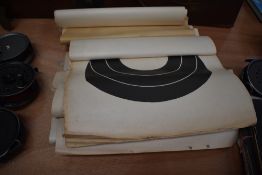 A selection of vintage paper rifle targets.