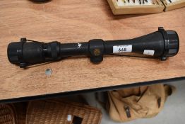 A Simmons rifle scope 3.5 to 10x40 with lens caps