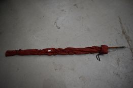 A vintage split cane fly fishing rod
