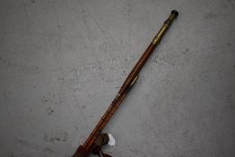 A nice quality unmarked cane 3pc fly fishing rod in unmarked sleeve