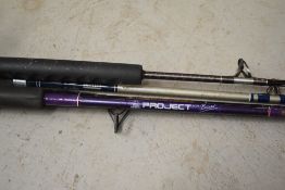 Four x boat rods including Ryobi Shakespeare and Trabucco one rod has a reel attached