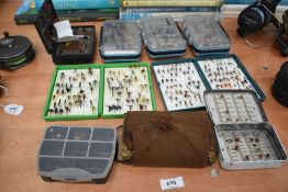 A large selection of small fishing Flies in containers