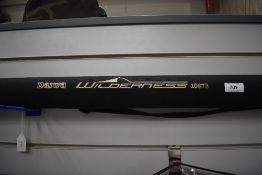 A Daiwa wilderness model 10673 3pc 10ft 6in fly rod in soft sleeve and hard case