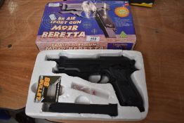 A BB air gun M93R Beretta