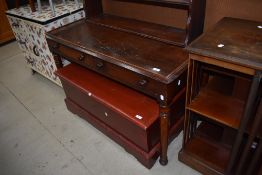 A Victorian stained frame desk having two frieze drawers, on turned legs