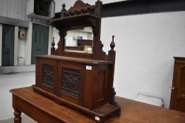 A Victorian mahogany hall or toilet mirror having Lincustra style panelled doors , self supporting