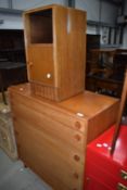 A vintage bedroom chest of five long drawers and a bedside cabinet