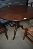 A 19th Century pedestal table of turned column and triple splay legs