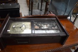 An early 20th Century oak cased wall clock