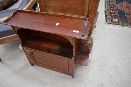 An Edwardian mahogany wall cabinet