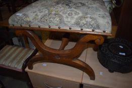 A 19th Century walnut cross frame dressing stool