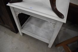 A small painted side table