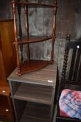 A laminate open fronted cabinet and reproduction wall shelf
