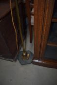 A vintage brass standard lamp