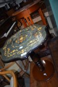 A reproduction continental style occasional table