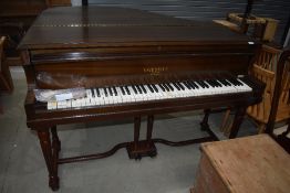 An early 20th Century baby grand piano, Eavestaff , in need of some restoration to keys etc