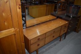 A vintage long john style dressing table