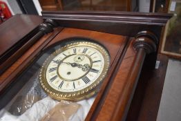 A late 19th/early 20th mahogany cased Vienna style wall clock